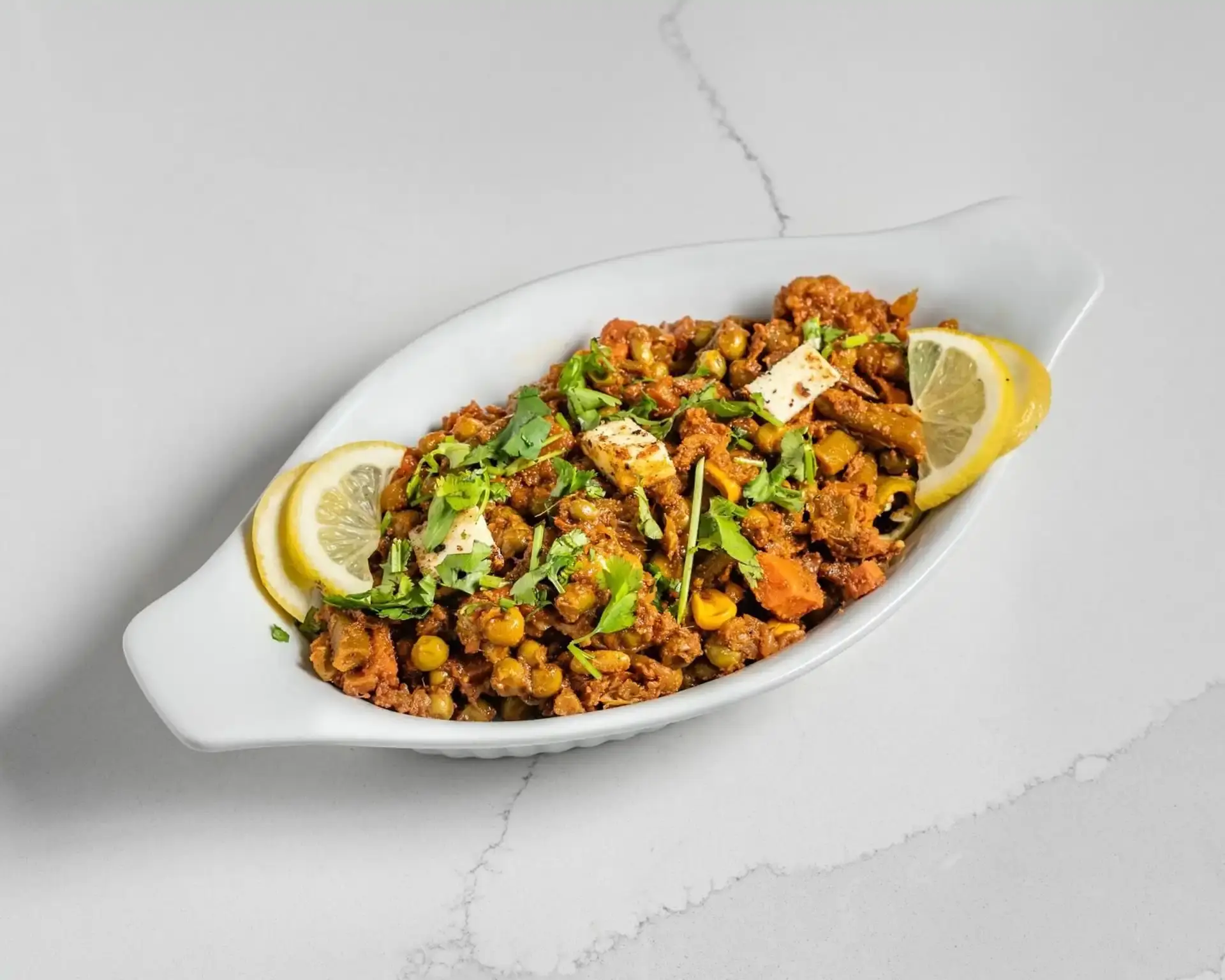 Fresh halal ingredients at Twist of TAJ Calgary