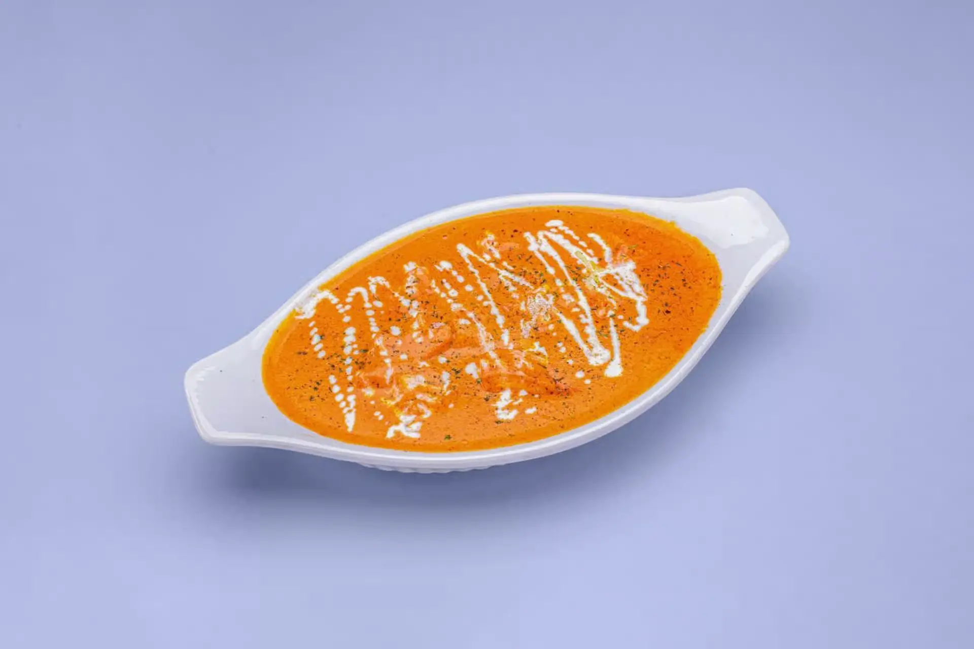 Twist of TAJ Butter Chicken Calgary creamy tomato sauce