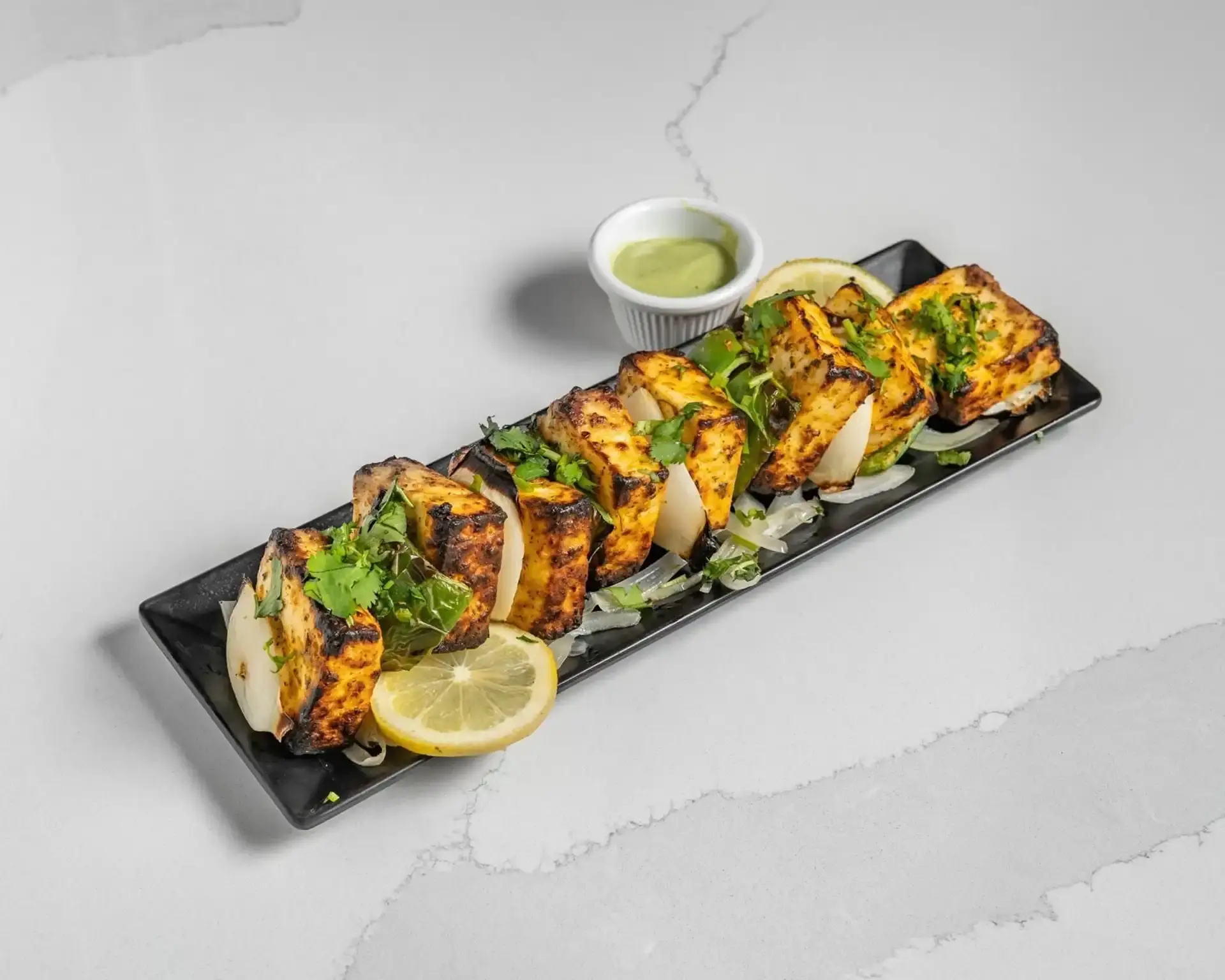 Twist of TAJ Paneer Tikka Calgary marinated tandoor vegetarian